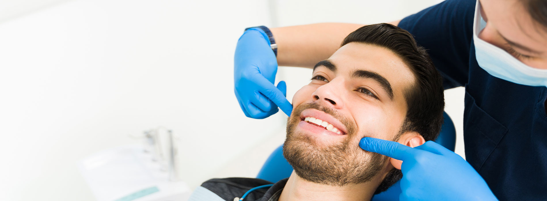 A dental professional providing a teeth cleaning service to a patient.